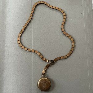 Antique Victorian-era gold-filled book chain necklace with locket